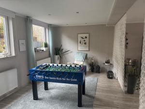 a table in a room with a lego game at Premium Lodge nahe Cochem - 5-Sterne- Ferienwohnung - 149 qm - für 2-6 Gäste in Greimersburg