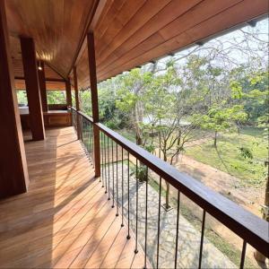 a view from the balcony of a house at Tribe Wilpattu - Eco Lodge in Wilpattu