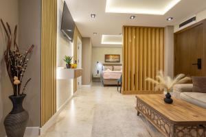 a living room with a couch and a table at Apartments Polejanov in Razlog +161 photos