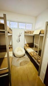 a room with a bunch of bunk beds at Bayanihan Flats 2 in Mactan