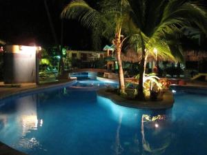 The swimming pool at or close to Cocomarindo Condo #72
