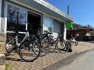 a group of bikes parked outside of a building at Bungalow Schönblick in Pirna