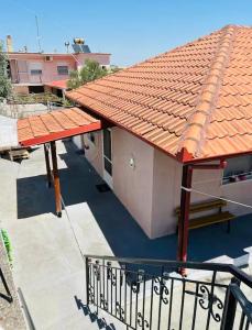 an overhead view of a house with an orange roof at Sophia in Sfendámion