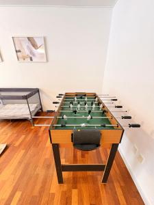 a billiard table in a room with at K&V Apartments Billund Near Legoland #1 in Billund
