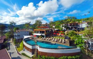 an aerial view of a house with a swimming pool at Amari Phuket in Patong Beach