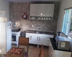 Kuchyň nebo kuchyňský kout v ubytování Flat Visual do Porto