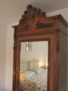 Postel nebo postele na pokoji v ubytování Residence Casprini da Omero