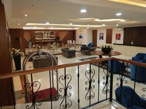 a lobby of a hospital with chairs and tables at President Hotel in Jounieh