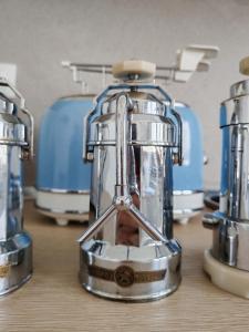 a blender sitting on top of a wooden table at B&B Chiara in Limena