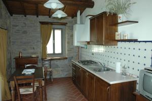 Kuchyň nebo kuchyňský kout v ubytování Agriturismo Francini