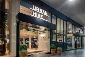 a store front with a sign that reads urban hive at Urban Hive Milano in Milan