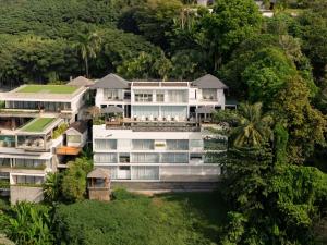 an aerial view of a building at Bluesiam Villa - SHA Certified in Surin Beach