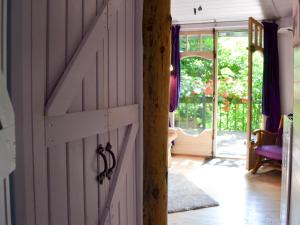 an open door in a room with a sliding door at Beach Retreat - Ukc2322 in St Ives
