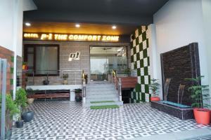 a lobby of a building with a sign that reads the comfort zone at Hotel P1 The Comfort Zone in Jalandhar