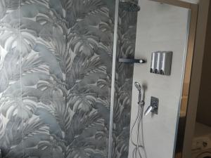 a shower stall with auliculiculiculiculiculiculiculiculiculiculic at La terrazza del Papa in Pienza +21 photos
