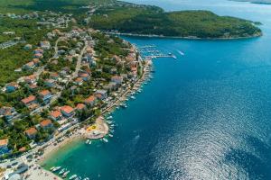an aerial view of a small island in the water at House Scaena in Jadranovo +70 photos