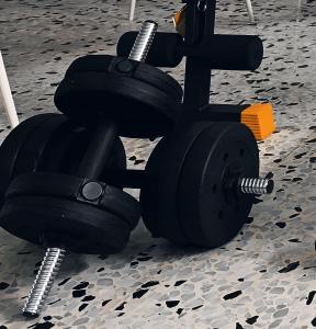 a pair of black wheels sitting on the ground at Le volte di Umberto Scirocco in Sogliano Cavour