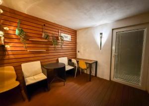 a dining room with a table and chairs at Celia Center Celje Apartment in Celje