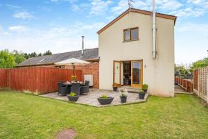 a house with a patio in the yard at 4 Bed in Wonastow oc-k29425 in Wonastow