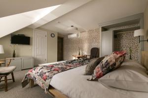 Katil atau katil-katil dalam bilik di Guest House Mazais Ansis