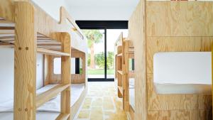 a group of bunk beds in a room at Villa Horizonte in Finestrat +75 photos
