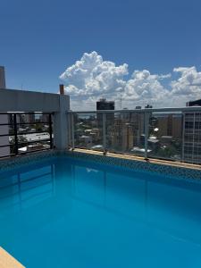a swimming pool on the roof of a building with a view at Terrazas RV Adults Only No se cobran los impuestos in Posadas