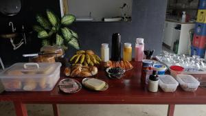 a table with a bunch of food on it at Pousada Rancho do Cometa in Ubajara