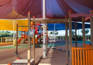 a park with a playground with a slide at Gate Tower, 1BR Reem Island, Near Galleria, Abu Dhabi Mall & the City in Abu Dhabi