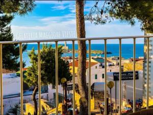 a view of a city from a balcony at I Cordari B&B in Vieste