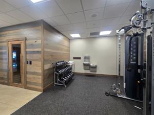 a room with a hair salon with wooden walls at The Wisconsin Hotel & Conference Center in Wisconsin Dells