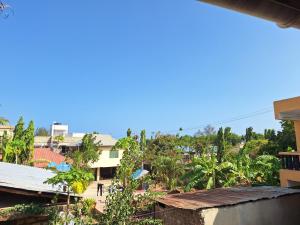 a view of a city from a building at Janari Homes in Diani Beach