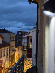 a view of a city from a balcony at Elegant City House Moderno no Centro da Cidade in Chaves