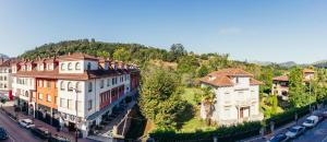 an aerial view of a city with buildings and cars at Adrimarcangas 2 in Cangas de Onís