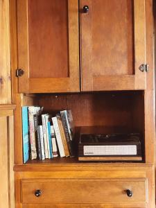 a book shelf with books on it at Campo Carnelian in Carnelian Bay