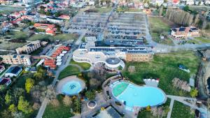an aerial view of a resort with a pool at SERENITAS Apartment RIVA PARK in Dunajská Streda +32 photos