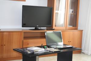 TV a/nebo společenská místnost v ubytování Barceloneta UPartments