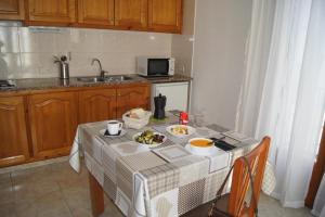 Kuchyň nebo kuchyňský kout v ubytování Barceloneta UPartments