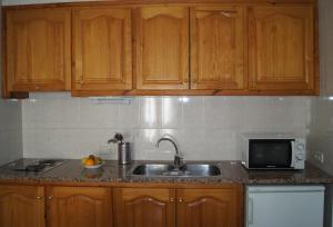 Kuchyň nebo kuchyňský kout v ubytování Barceloneta UPartments