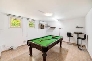 a room with a pool table in it at Beachfront Villa Mare with Jaccuzi and Infinity Pool in Kissonerga