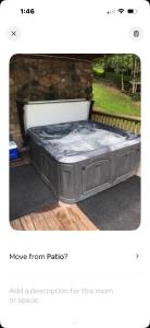 a bed sitting on top of avisor at Mountain Chalet in Fairfield