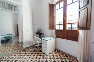 an office with a desk and a window at La Casa del Mar in Garachico +67 photos