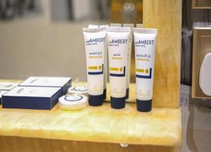 a group of four products sitting on a counter at Lambert ApartHotel in Jeddah