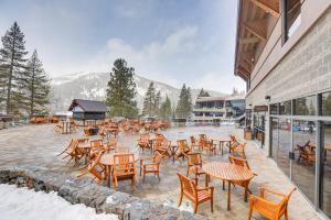 a group of tables and chairs on a patio at Everline Suite w/ Resort Perks! 7 Mi to Lake Tahoe in Olympic Valley
