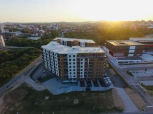 an aerial view of a building in a city at I&I Tesla IV in Kragujevac