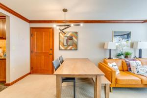 a living room with a table and a couch at Everline Suite w/ Resort Perks! 7 Mi to Lake Tahoe in Olympic Valley