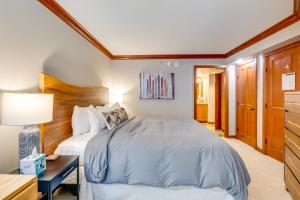 a bedroom with a bed and a desk with a lamp at Everline Suite w/ Resort Perks! 7 Mi to Lake Tahoe in Olympic Valley +20 photos