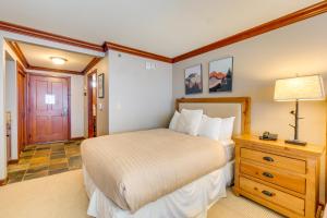 a bedroom with a bed and a dresser with a lamp at Olympic Valley Summer Sanctuary in Everline Resort in Olympic Valley +27 photos