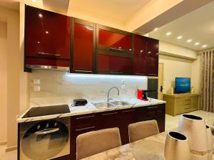 a kitchen with a sink and a counter top at Aggelos Room 2 in Volos