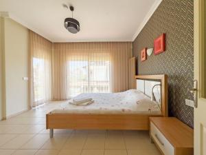 a bedroom with a bed and a window at Paradise Town Villa Abel in Belek +71 photos