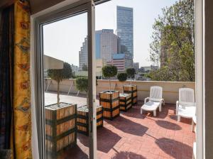 a balcony with a view of a city skyline at Hotel New York Ciudad de Mexico in Mexico City